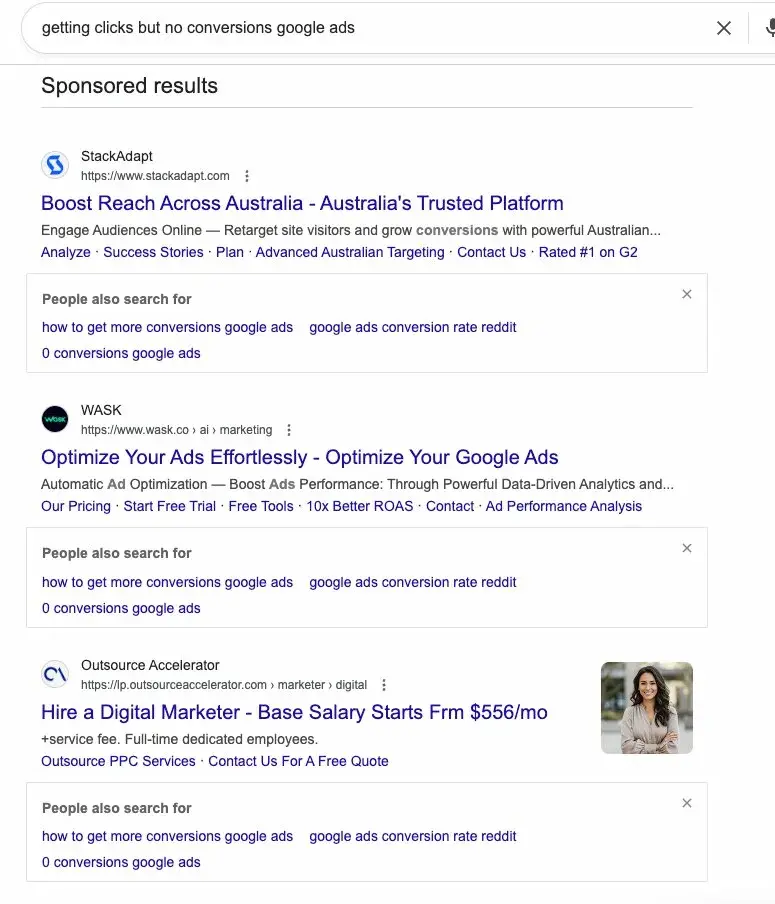 Google search results page for 'getting clicks but no conversions google ads' showing sponsored results from StackAdapt promoting reach across Australia, WASK offering ad optimization, and Outsource Accelerator advertising remote digital marketers starting at $556 per month. The repetition of irrelevant ads continues across multiple search attempts.