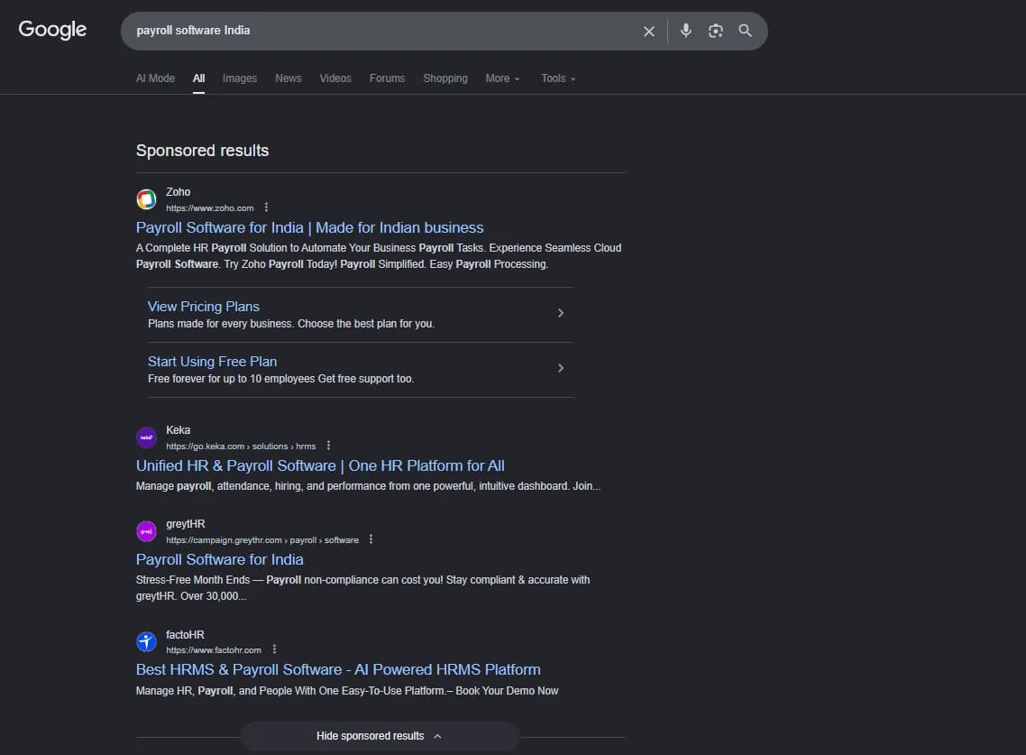Google search results page for a payroll software query, showing the paid ads that appear above the organic listings.
