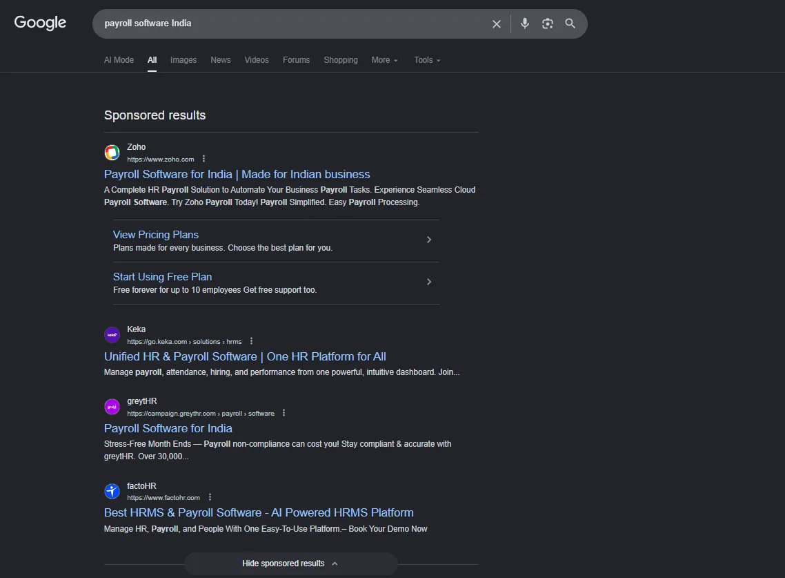 Google search results page for a payroll software query, showing the paid ads that appear above the organic listings.